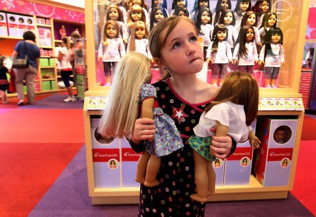 Friends and Family Day at American Girl Store- girl looking at display